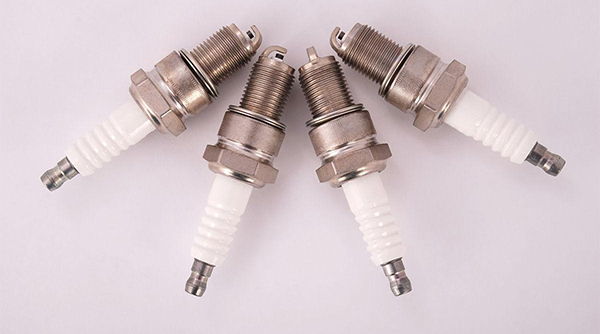 Can replacing a spark plug really improve power?